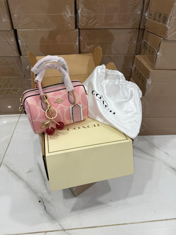 Coach Light Pink Bag with Cherry Charm included