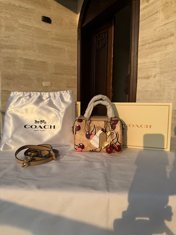 COACH CHERRY PATTERN BAG IN BROWN WITH CHERRY CHARM