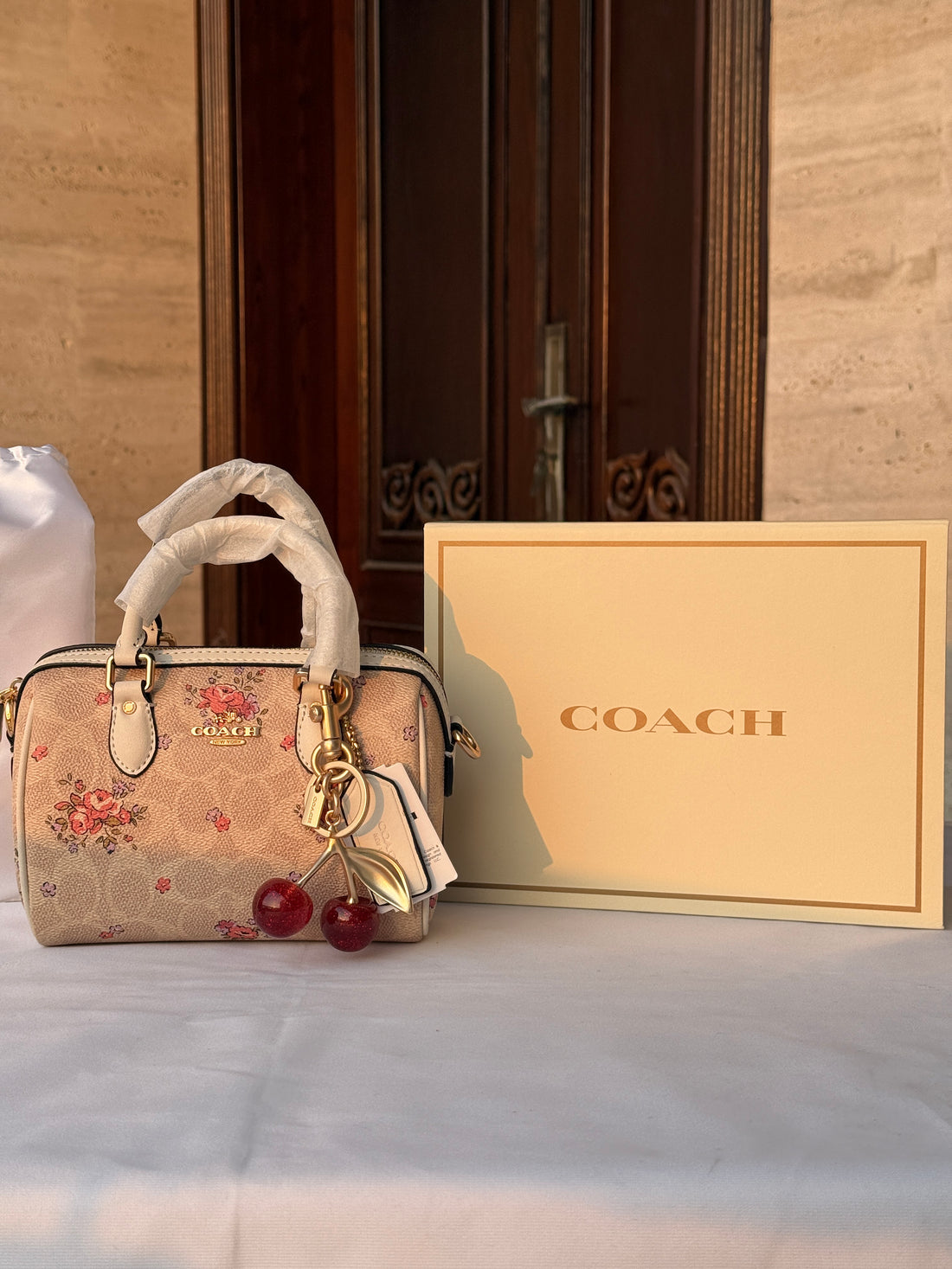 COACH LIGHT BROWN FLOWER PATTERN BAG CHERRY CHARM