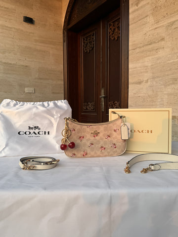 COACH LIGHT BROWN FLOWER PATTERN BAG WITH CHERRY CHARM AND 2 STRIPS