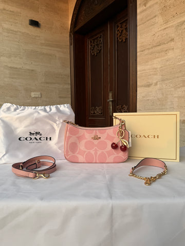 COACH PINK BAG WITH CHERRY CHARM AND 2 STRIPS